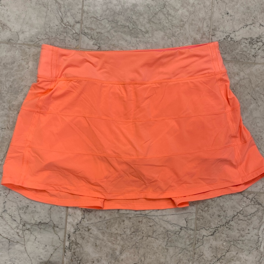 Lululemon pace rival 10 tall (14” length) skirt.